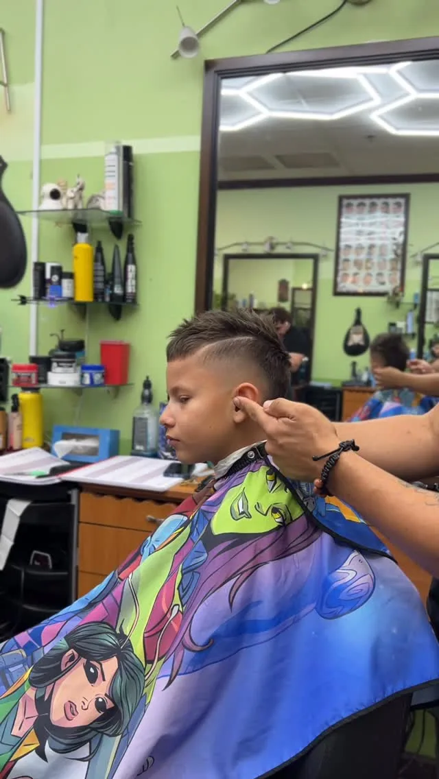 Video of a children’s haircut at Tijeras Barbershop